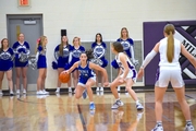 In the district final game versus Milford, Haley Scholting drives down court.